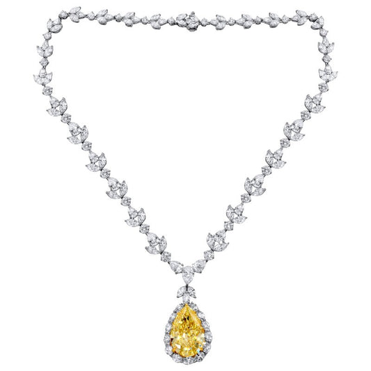 Platinum, 35.31ct Pear Shape Fancy Intense Yellow Diamond and Diamond Pendant Necklace
